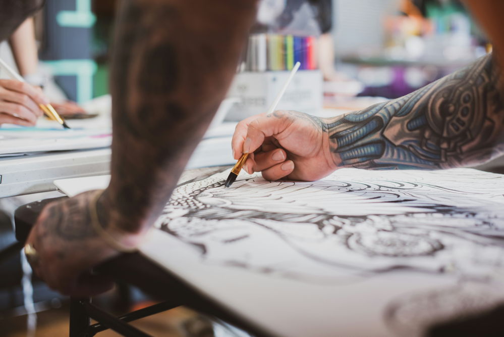Design Your Own Tattoo by sharing your stories with our AI Designer